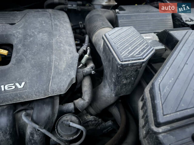 Красный Хендай Туксон, объемом двигателя 2 л и пробегом 110 тыс. км за 17000 $, фото 11 на Automoto.ua