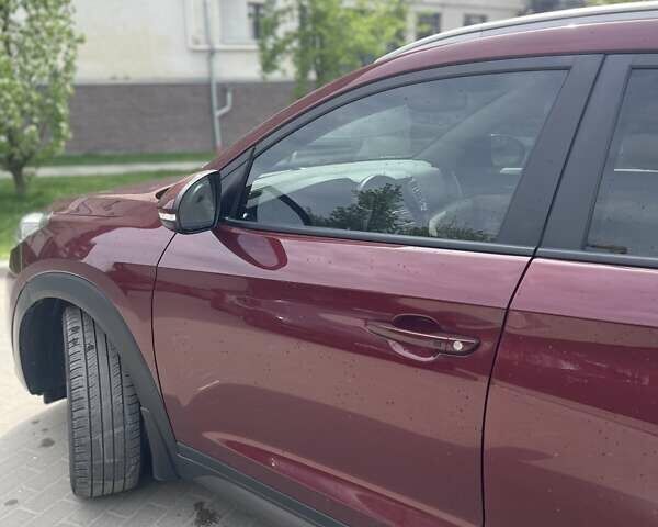 Красный Хендай Туксон, объемом двигателя 1.6 л и пробегом 65 тыс. км за 15500 $, фото 7 на Automoto.ua