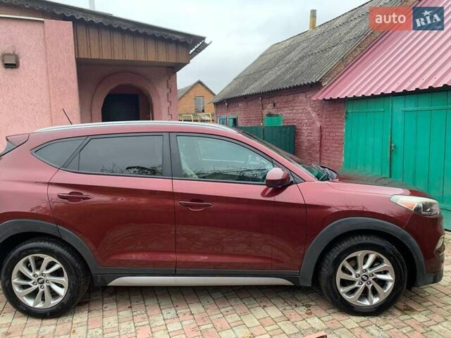Красный Хендай Туксон, объемом двигателя 2 л и пробегом 123 тыс. км за 15300 $, фото 3 на Automoto.ua