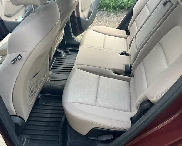 Червоний Хендай Туксон, об'ємом двигуна 2 л та пробігом 101 тис. км за 15700 $, фото 6 на Automoto.ua