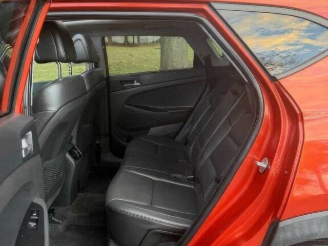 Червоний Хендай Туксон, об'ємом двигуна 1.6 л та пробігом 72 тис. км за 15500 $, фото 11 на Automoto.ua