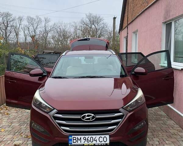 Красный Хендай Туксон, объемом двигателя 2 л и пробегом 123 тыс. км за 15300 $, фото 7 на Automoto.ua