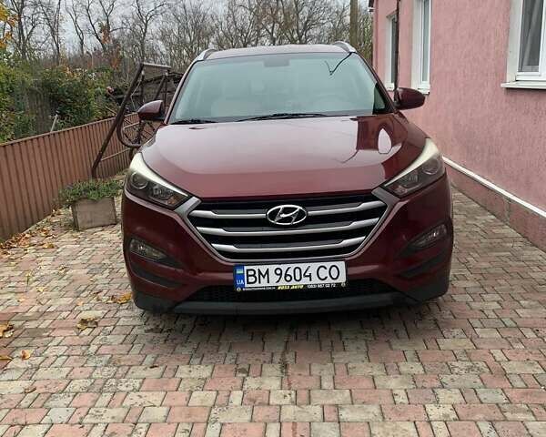 Красный Хендай Туксон, объемом двигателя 2 л и пробегом 123 тыс. км за 15300 $, фото 1 на Automoto.ua