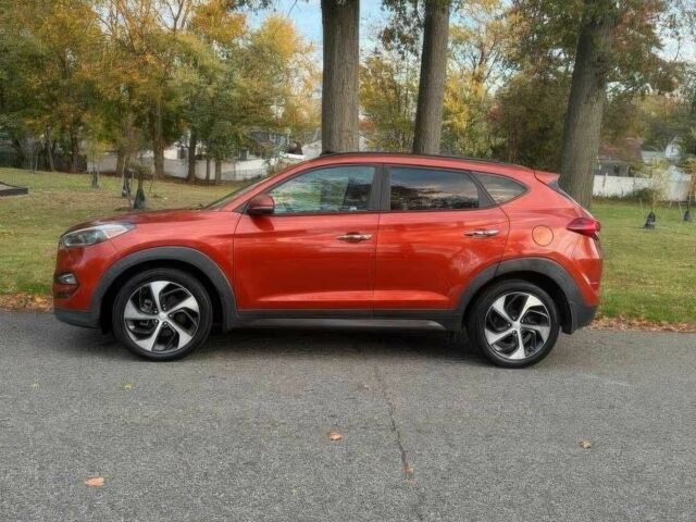 Червоний Хендай Туксон, об'ємом двигуна 1.6 л та пробігом 72 тис. км за 15500 $, фото 3 на Automoto.ua