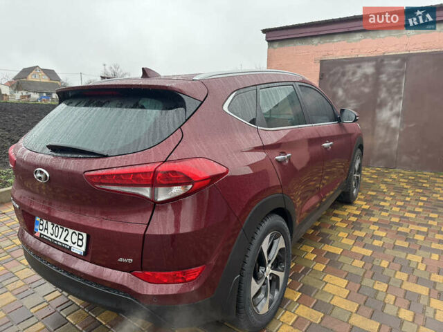 Красный Хендай Туксон, объемом двигателя 2 л и пробегом 110 тыс. км за 17000 $, фото 7 на Automoto.ua