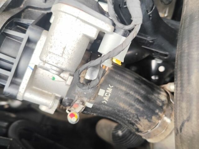 Червоний Хендай Туксон, об'ємом двигуна 2 л та пробігом 110 тис. км за 19800 $, фото 19 на Automoto.ua