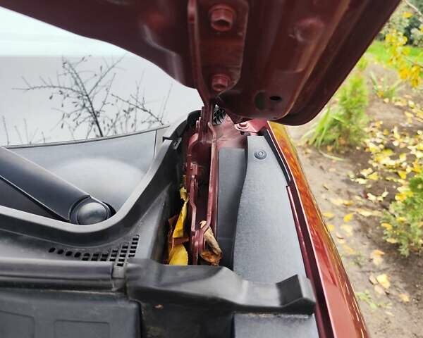 Красный Хендай Туксон, объемом двигателя 2.02 л и пробегом 110 тыс. км за 19800 $, фото 79 на Automoto.ua