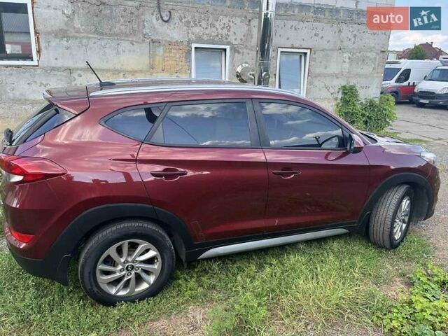 Червоний Хендай Туксон, об'ємом двигуна 2 л та пробігом 101 тис. км за 15700 $, фото 17 на Automoto.ua