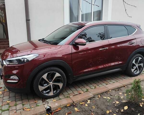 Красный Хендай Туксон, объемом двигателя 2.02 л и пробегом 110 тыс. км за 19800 $, фото 6 на Automoto.ua