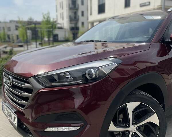 Красный Хендай Туксон, объемом двигателя 1.6 л и пробегом 65 тыс. км за 15500 $, фото 8 на Automoto.ua