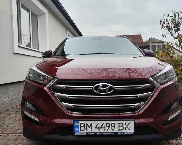 Красный Хендай Туксон, объемом двигателя 2.02 л и пробегом 110 тыс. км за 19800 $, фото 1 на Automoto.ua