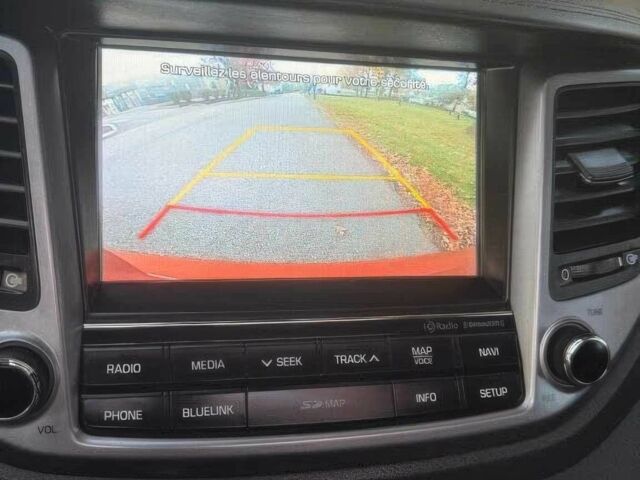 Червоний Хендай Туксон, об'ємом двигуна 1.6 л та пробігом 72 тис. км за 15500 $, фото 10 на Automoto.ua