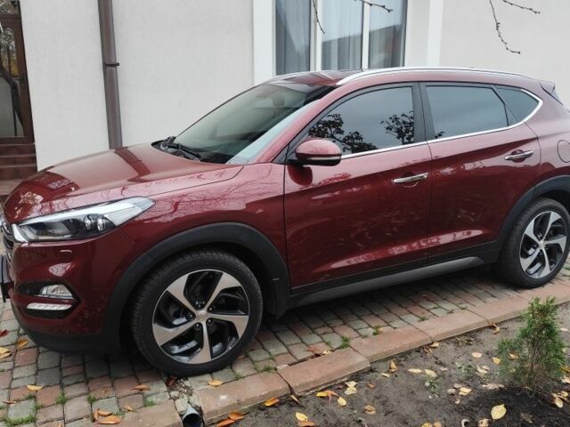 Червоний Хендай Туксон, об'ємом двигуна 2 л та пробігом 110 тис. км за 19800 $, фото 6 на Automoto.ua