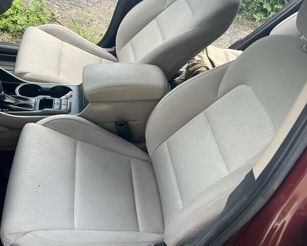 Червоний Хендай Туксон, об'ємом двигуна 2 л та пробігом 101 тис. км за 15700 $, фото 7 на Automoto.ua