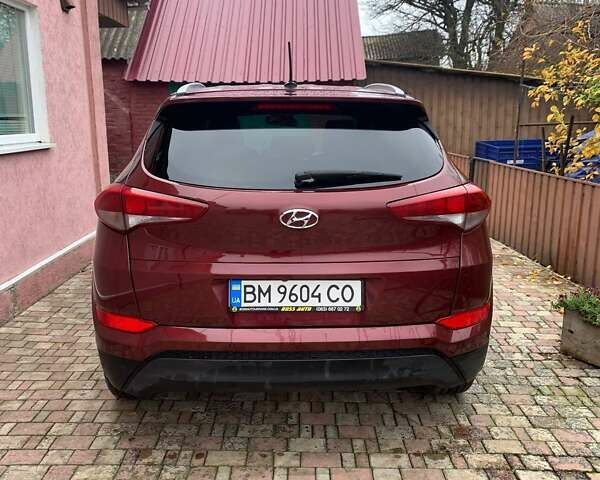 Красный Хендай Туксон, объемом двигателя 2 л и пробегом 123 тыс. км за 15300 $, фото 8 на Automoto.ua