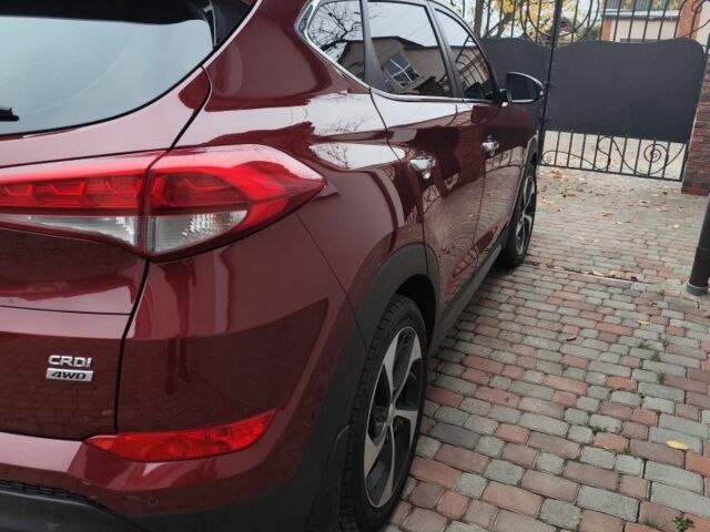 Червоний Хендай Туксон, об'ємом двигуна 2 л та пробігом 110 тис. км за 19800 $, фото 3 на Automoto.ua