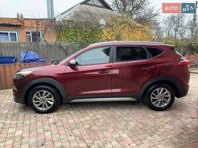 Красный Хендай Туксон, объемом двигателя 2 л и пробегом 123 тыс. км за 15300 $, фото 6 на Automoto.ua
