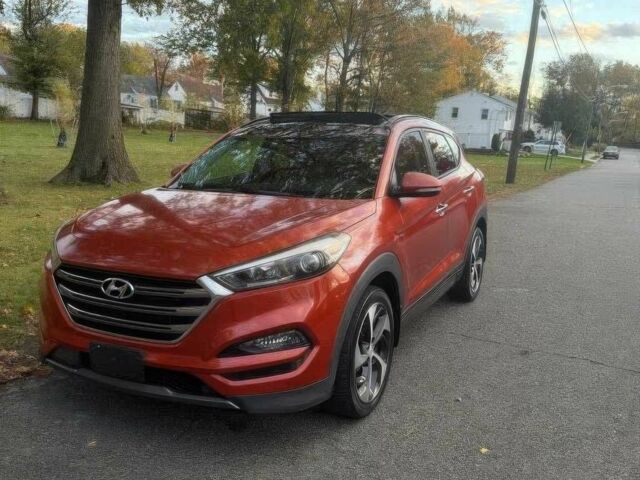 Червоний Хендай Туксон, об'ємом двигуна 1.6 л та пробігом 72 тис. км за 15500 $, фото 2 на Automoto.ua