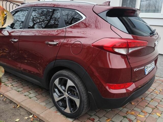 Червоний Хендай Туксон, об'ємом двигуна 2 л та пробігом 110 тис. км за 19800 $, фото 5 на Automoto.ua