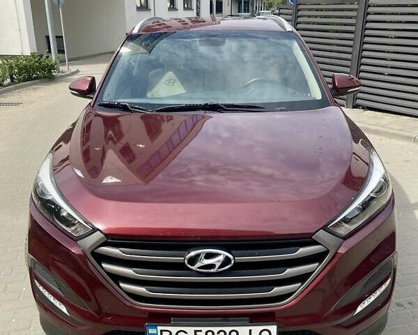 Красный Хендай Туксон, объемом двигателя 1.6 л и пробегом 65 тыс. км за 15500 $, фото 1 на Automoto.ua