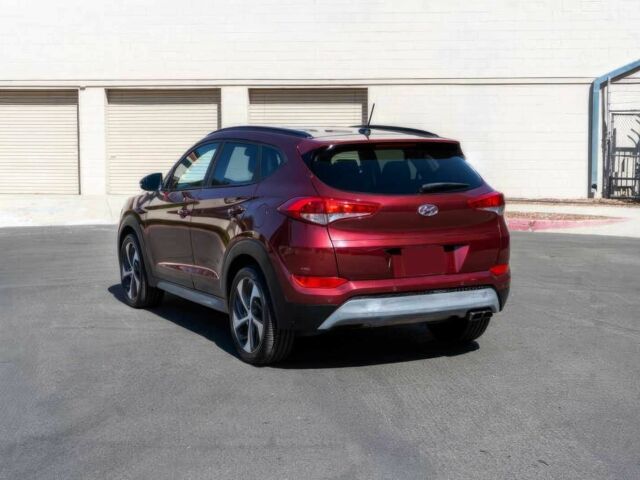 Червоний Хендай Туксон, об'ємом двигуна 1.6 л та пробігом 54 тис. км за 10300 $, фото 5 на Automoto.ua