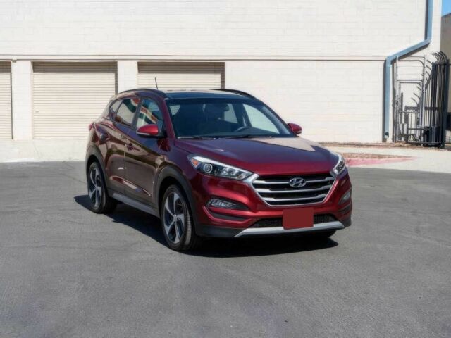 Червоний Хендай Туксон, об'ємом двигуна 1.6 л та пробігом 54 тис. км за 10300 $, фото 2 на Automoto.ua