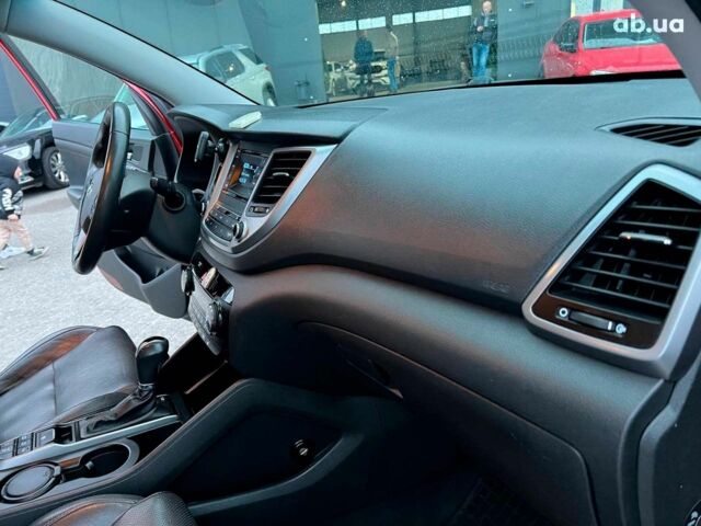 Червоний Хендай Туксон, об'ємом двигуна 2 л та пробігом 136 тис. км за 18690 $, фото 39 на Automoto.ua