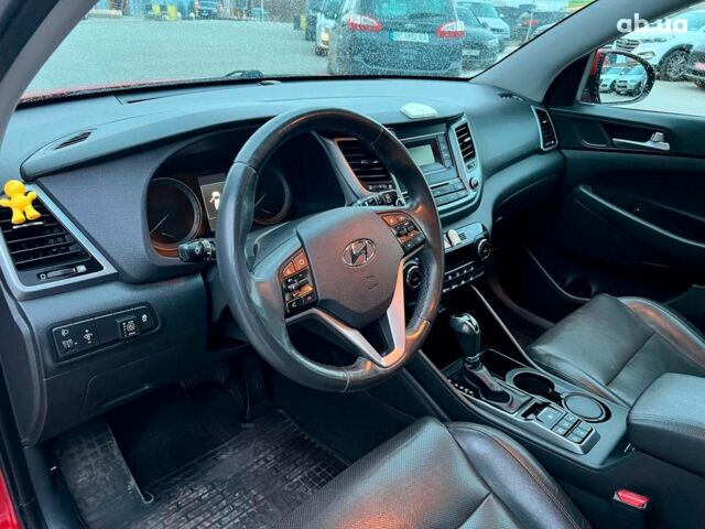 Червоний Хендай Туксон, об'ємом двигуна 2 л та пробігом 136 тис. км за 18690 $, фото 16 на Automoto.ua