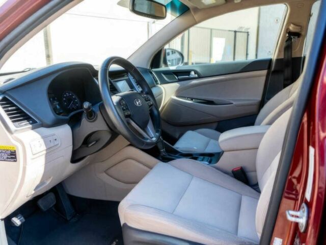 Червоний Хендай Туксон, об'ємом двигуна 1.6 л та пробігом 54 тис. км за 10300 $, фото 8 на Automoto.ua