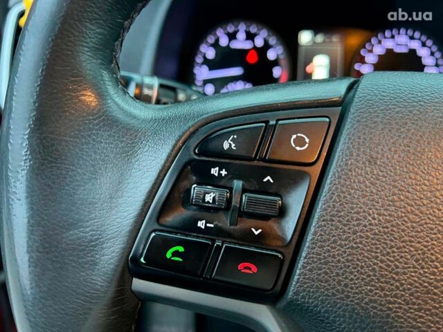 Червоний Хендай Туксон, об'ємом двигуна 2 л та пробігом 136 тис. км за 18690 $, фото 24 на Automoto.ua