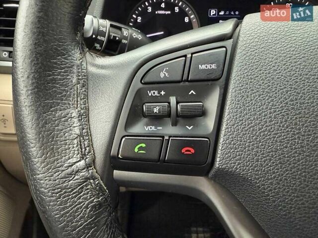 Червоний Хендай Туксон, об'ємом двигуна 1.59 л та пробігом 117 тис. км за 15890 $, фото 19 на Automoto.ua