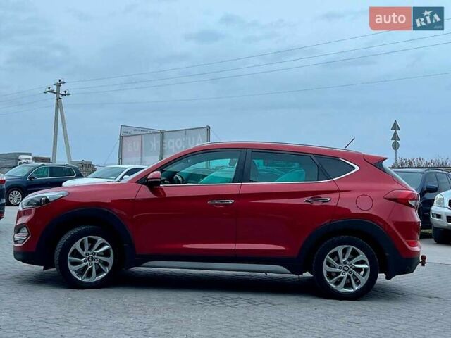 Червоний Хендай Туксон, об'ємом двигуна 2 л та пробігом 136 тис. км за 18690 $, фото 5 на Automoto.ua