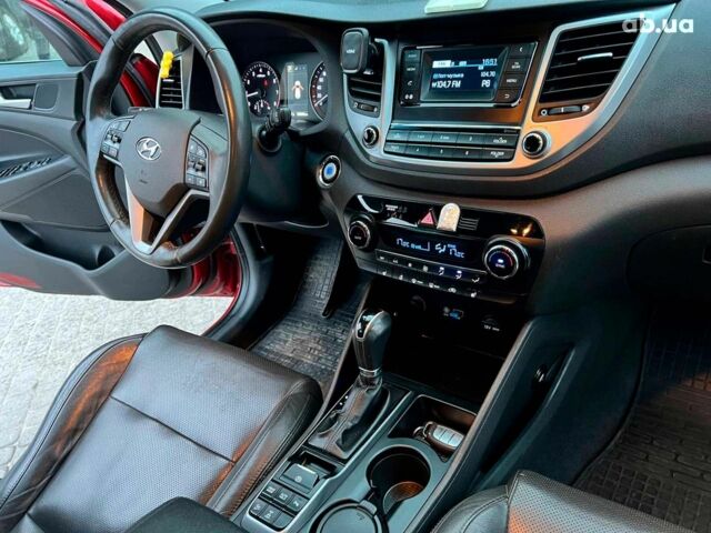 Червоний Хендай Туксон, об'ємом двигуна 2 л та пробігом 136 тис. км за 18690 $, фото 40 на Automoto.ua