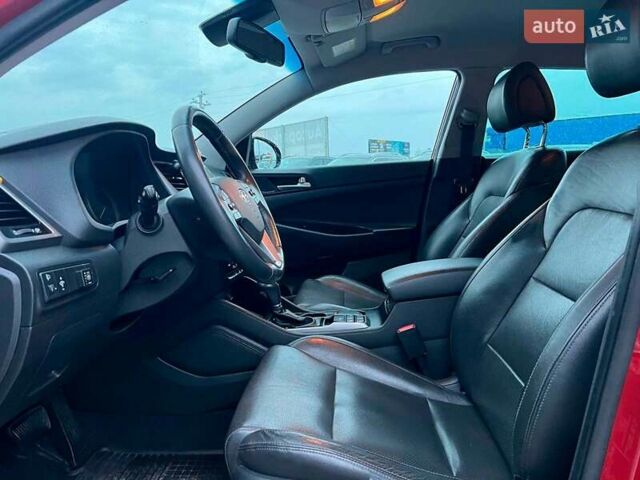 Червоний Хендай Туксон, об'ємом двигуна 2 л та пробігом 136 тис. км за 18690 $, фото 19 на Automoto.ua