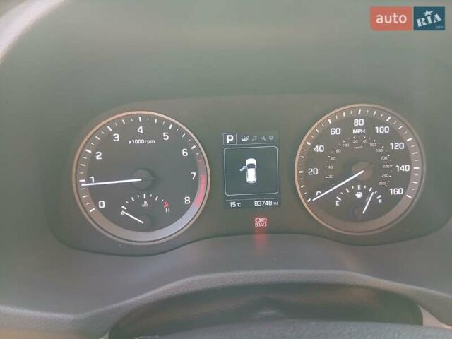 Красный Хендай Туксон, объемом двигателя 2 л и пробегом 133 тыс. км за 17900 $, фото 10 на Automoto.ua