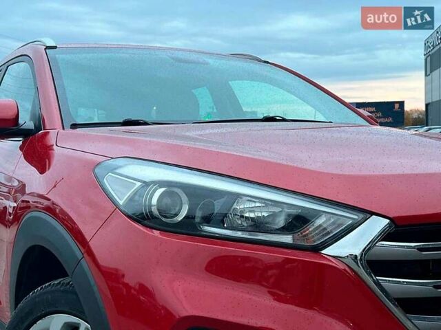 Червоний Хендай Туксон, об'ємом двигуна 2 л та пробігом 136 тис. км за 18690 $, фото 13 на Automoto.ua