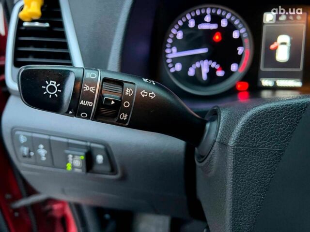 Червоний Хендай Туксон, об'ємом двигуна 2 л та пробігом 136 тис. км за 18690 $, фото 26 на Automoto.ua
