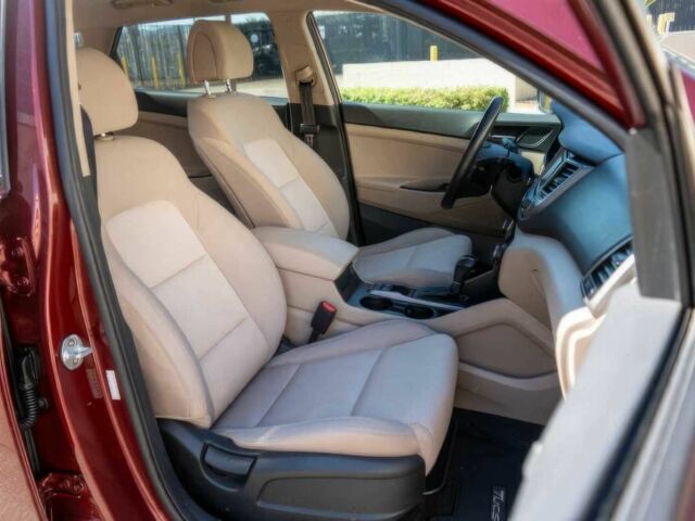 Червоний Хендай Туксон, об'ємом двигуна 1.6 л та пробігом 54 тис. км за 10300 $, фото 10 на Automoto.ua