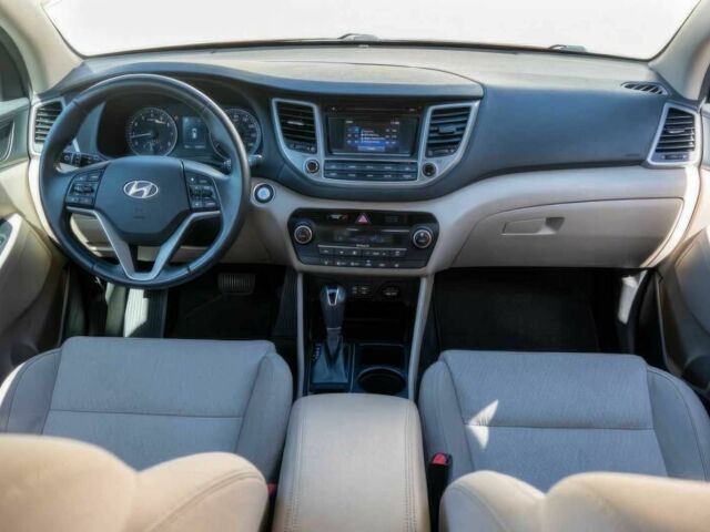 Червоний Хендай Туксон, об'ємом двигуна 1.6 л та пробігом 54 тис. км за 10300 $, фото 9 на Automoto.ua