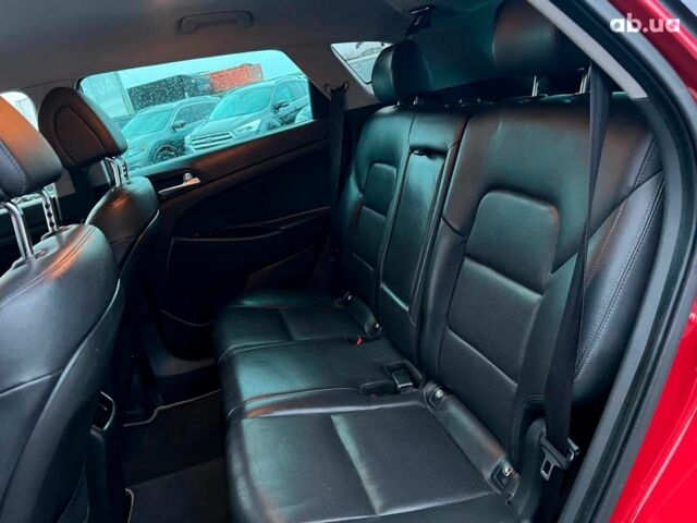 Червоний Хендай Туксон, об'ємом двигуна 2 л та пробігом 136 тис. км за 18690 $, фото 35 на Automoto.ua
