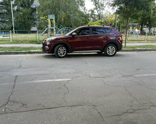 Красный Хендай Туксон, объемом двигателя 2 л и пробегом 102 тыс. км за 16900 $, фото 24 на Automoto.ua