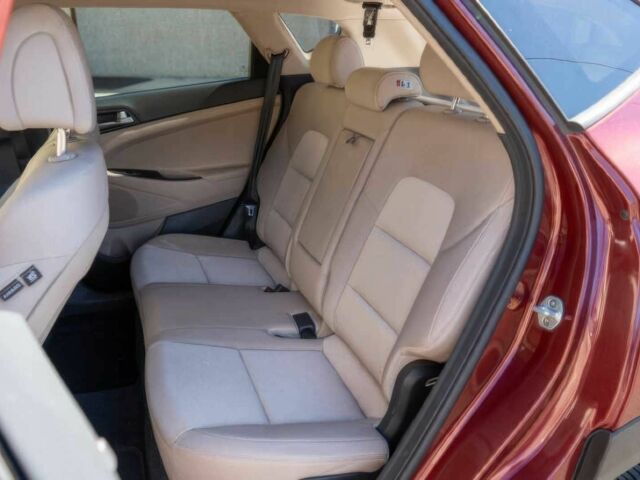 Червоний Хендай Туксон, об'ємом двигуна 1.6 л та пробігом 54 тис. км за 10300 $, фото 11 на Automoto.ua