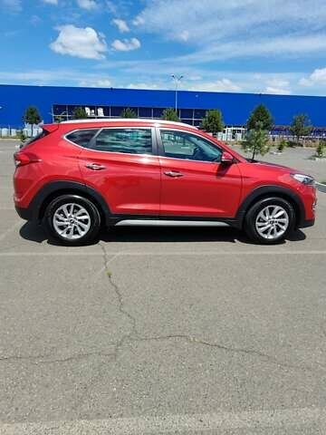 Червоний Хендай Туксон, об'ємом двигуна 2 л та пробігом 72 тис. км за 21500 $, фото 1 на Automoto.ua