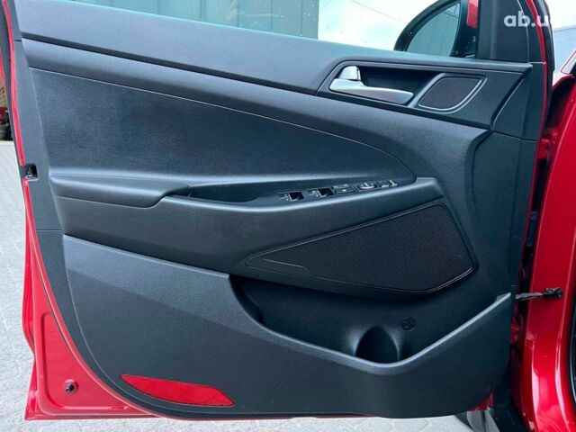 Червоний Хендай Туксон, об'ємом двигуна 2 л та пробігом 136 тис. км за 18690 $, фото 14 на Automoto.ua