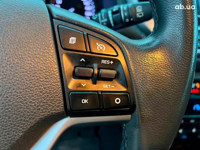 Червоний Хендай Туксон, об'ємом двигуна 2 л та пробігом 136 тис. км за 18690 $, фото 23 на Automoto.ua