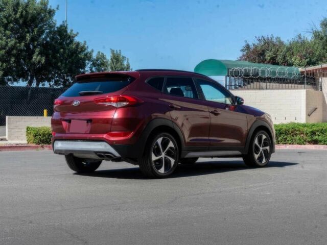 Червоний Хендай Туксон, об'ємом двигуна 1.6 л та пробігом 54 тис. км за 10300 $, фото 7 на Automoto.ua