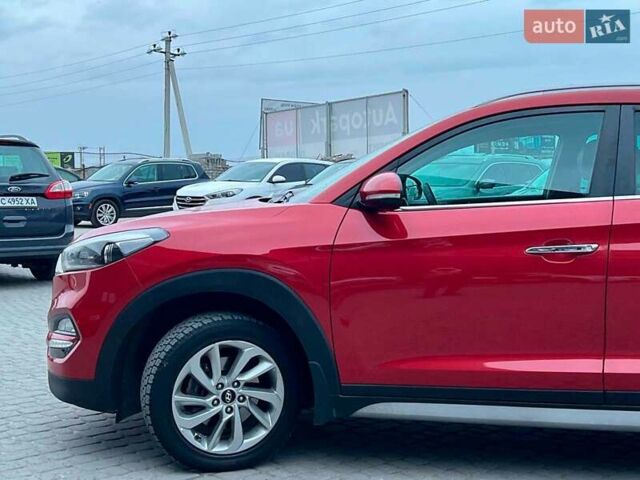 Червоний Хендай Туксон, об'ємом двигуна 2 л та пробігом 136 тис. км за 18690 $, фото 3 на Automoto.ua
