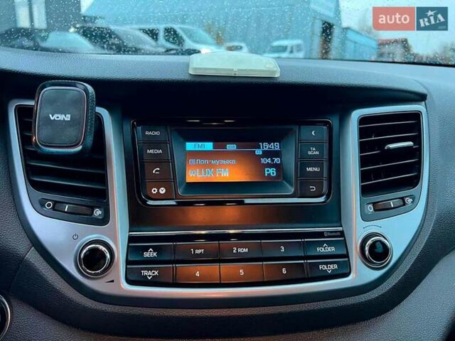 Червоний Хендай Туксон, об'ємом двигуна 2 л та пробігом 136 тис. км за 18690 $, фото 29 на Automoto.ua