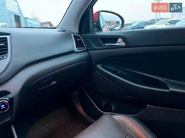 Червоний Хендай Туксон, об'ємом двигуна 2 л та пробігом 136 тис. км за 18690 $, фото 31 на Automoto.ua