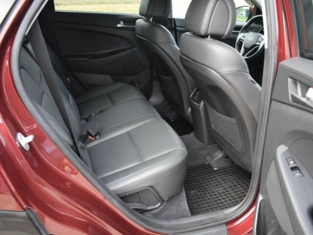 Червоний Хендай Туксон, об'ємом двигуна 2 л та пробігом 117 тис. км за 10300 $, фото 7 на Automoto.ua